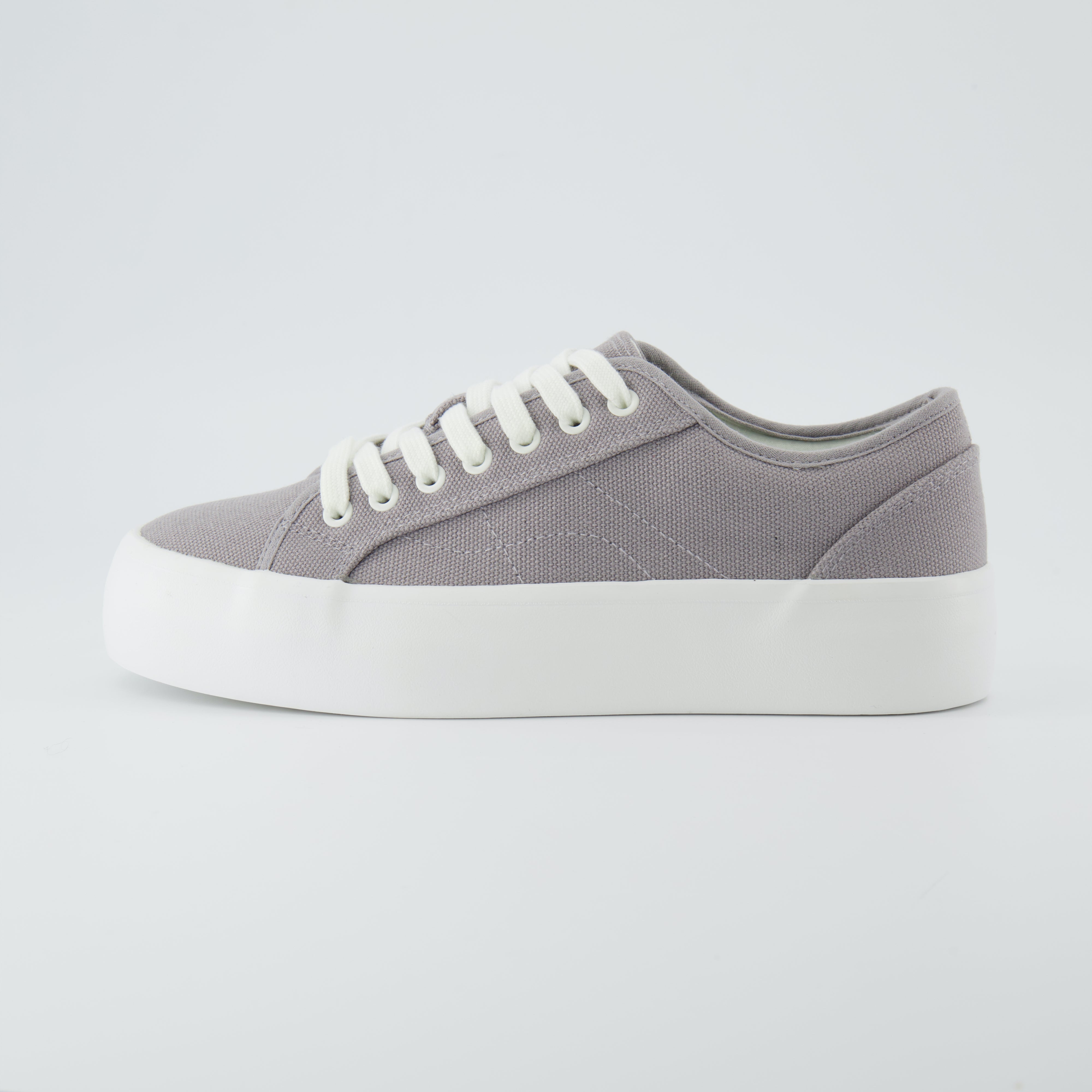 Tag Low Top Canvas Sneaker