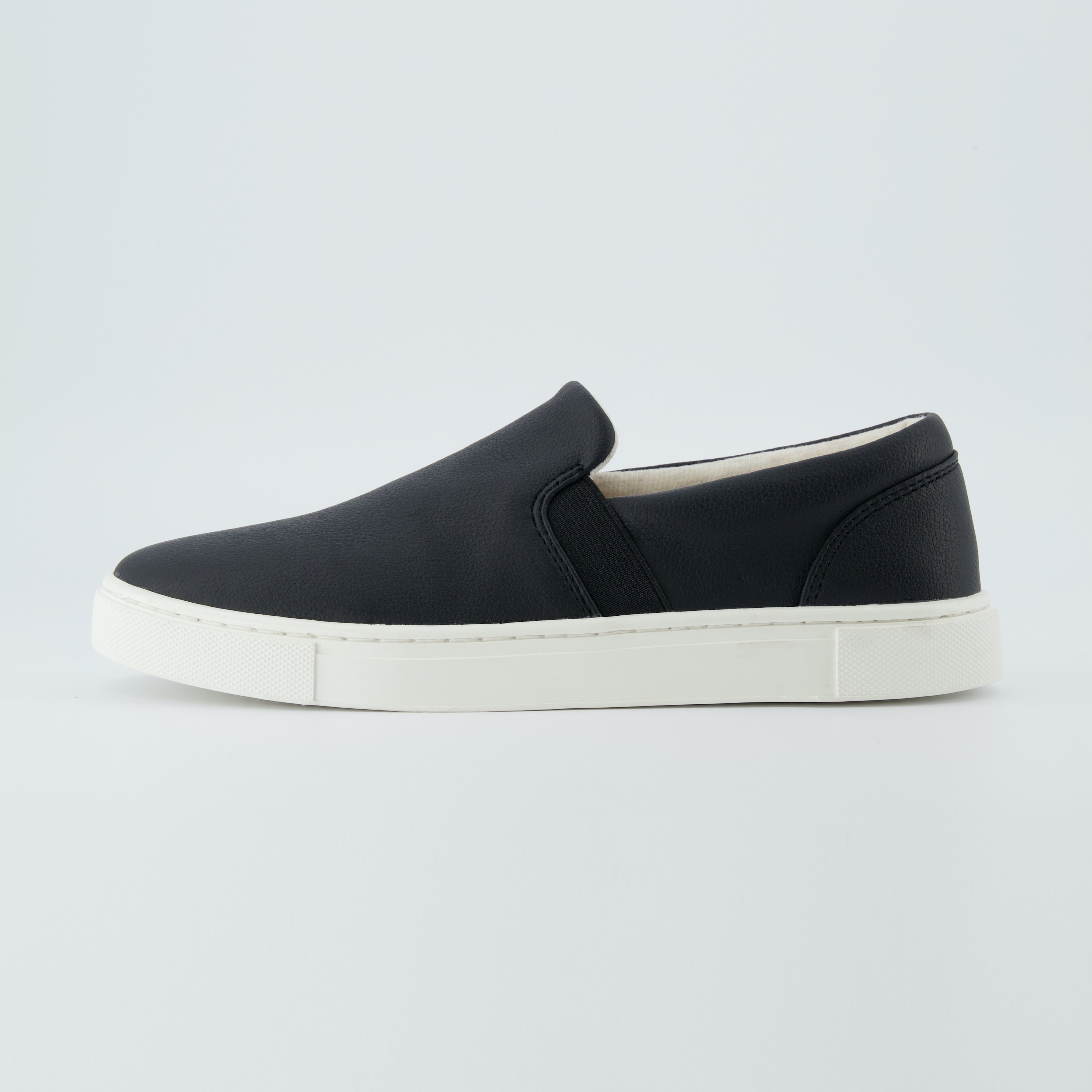 Black canvas slip on clearance sneakers